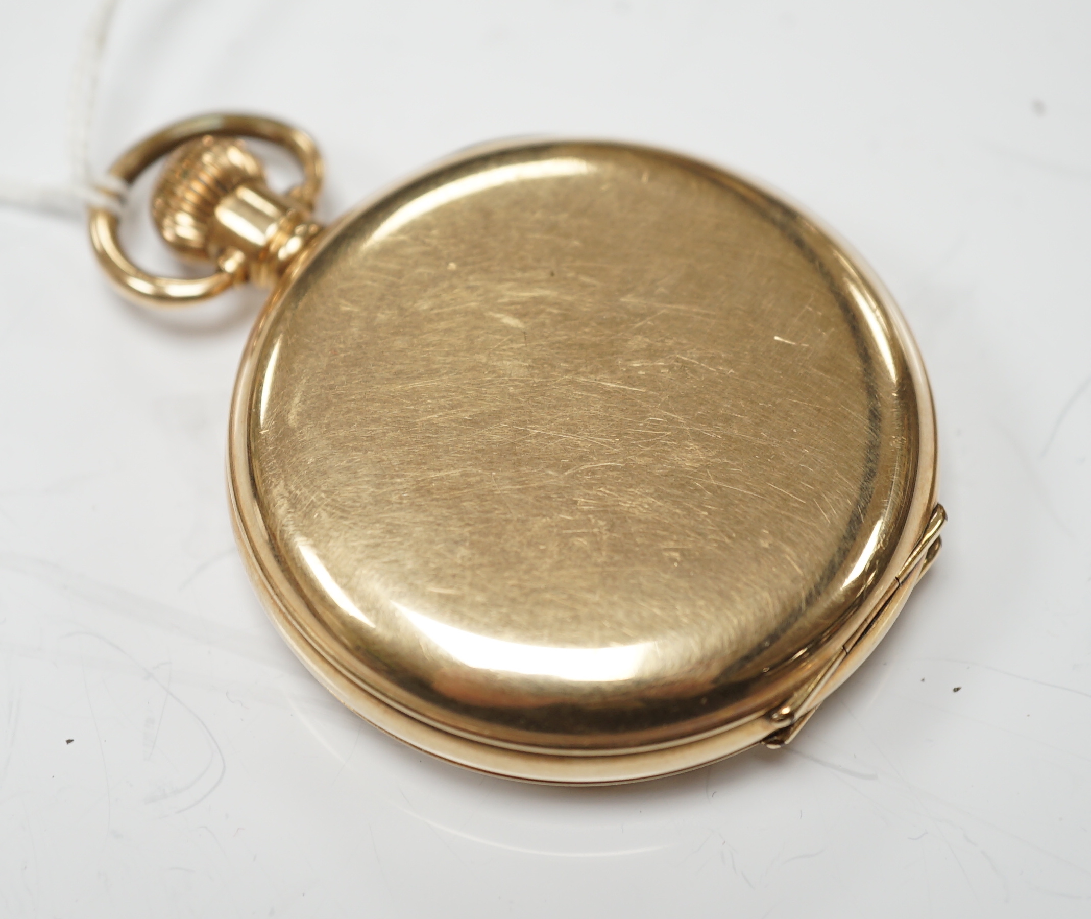 A Waltham gold plated open face keyless pocket watch, with Roman dial and subsidiary seconds.